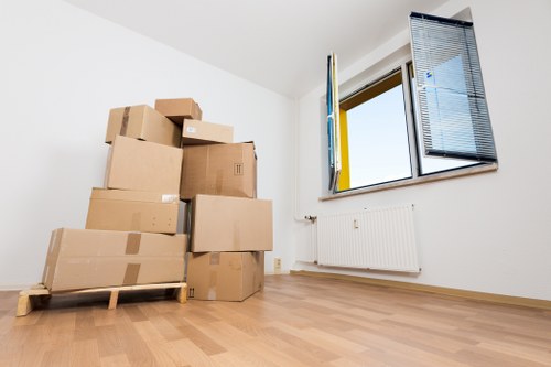 Packed boxes and furniture ready for a local house move in Hither Green