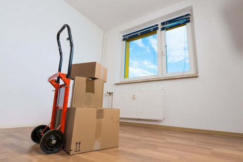 Team loading furniture for a flat move near Hither Green